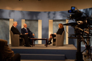 Image of Dennis McCuistion, Jim Faulk and Marianne Jennings on the McCuistion TV set.