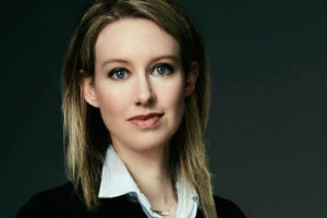 Photo of Elizabeth Holmes wearing a blazer and collared shirt.