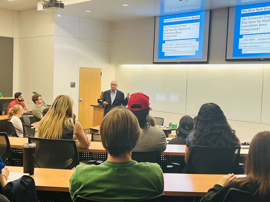 Image of Richard M. Bowen speaking to a group of accounting students at the University of North Texas.